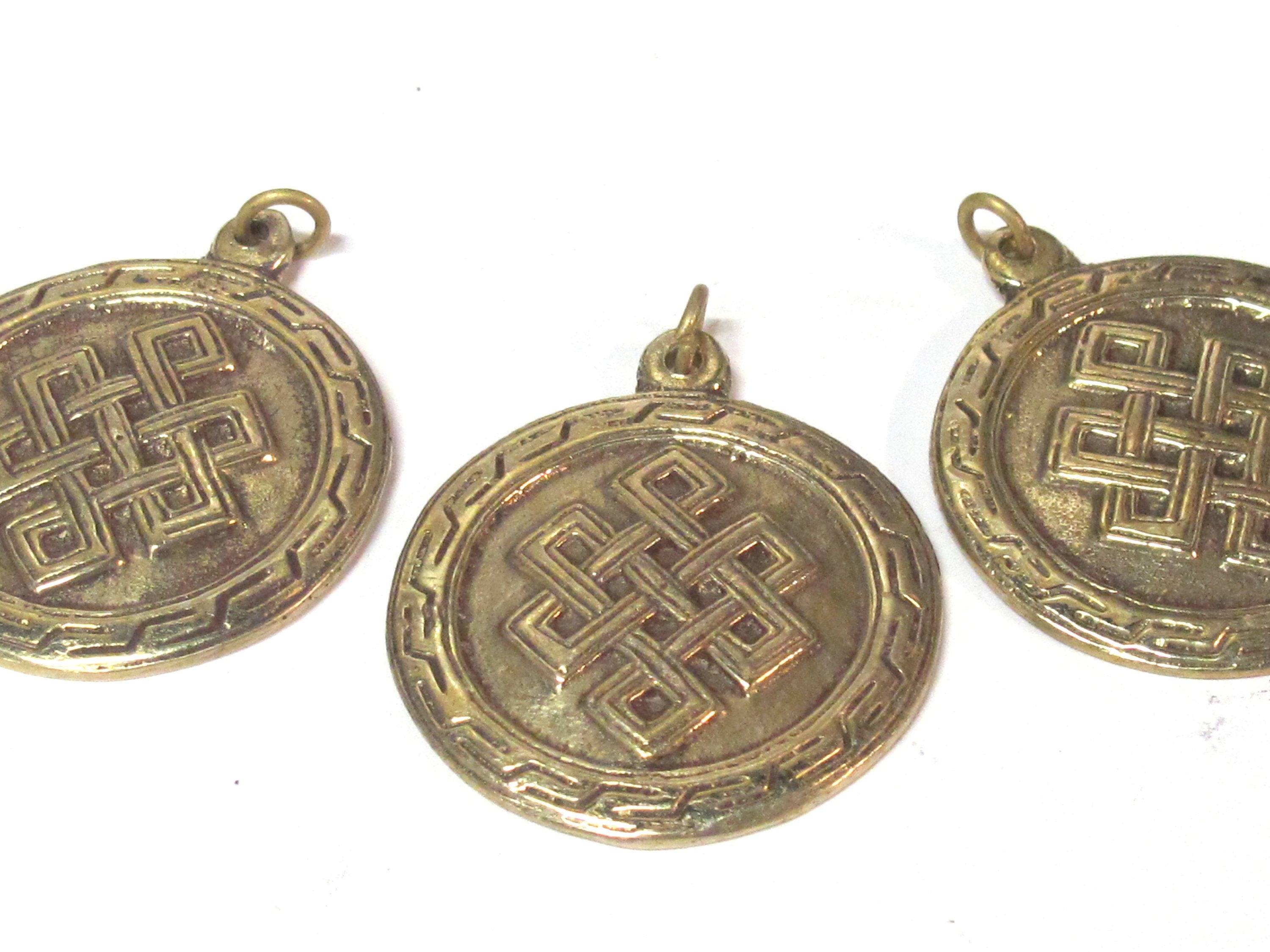 1 Pendant - Tibetan brass infinity knot endless knot symbol with reverse side om mantra pendant from Nepal - CP139