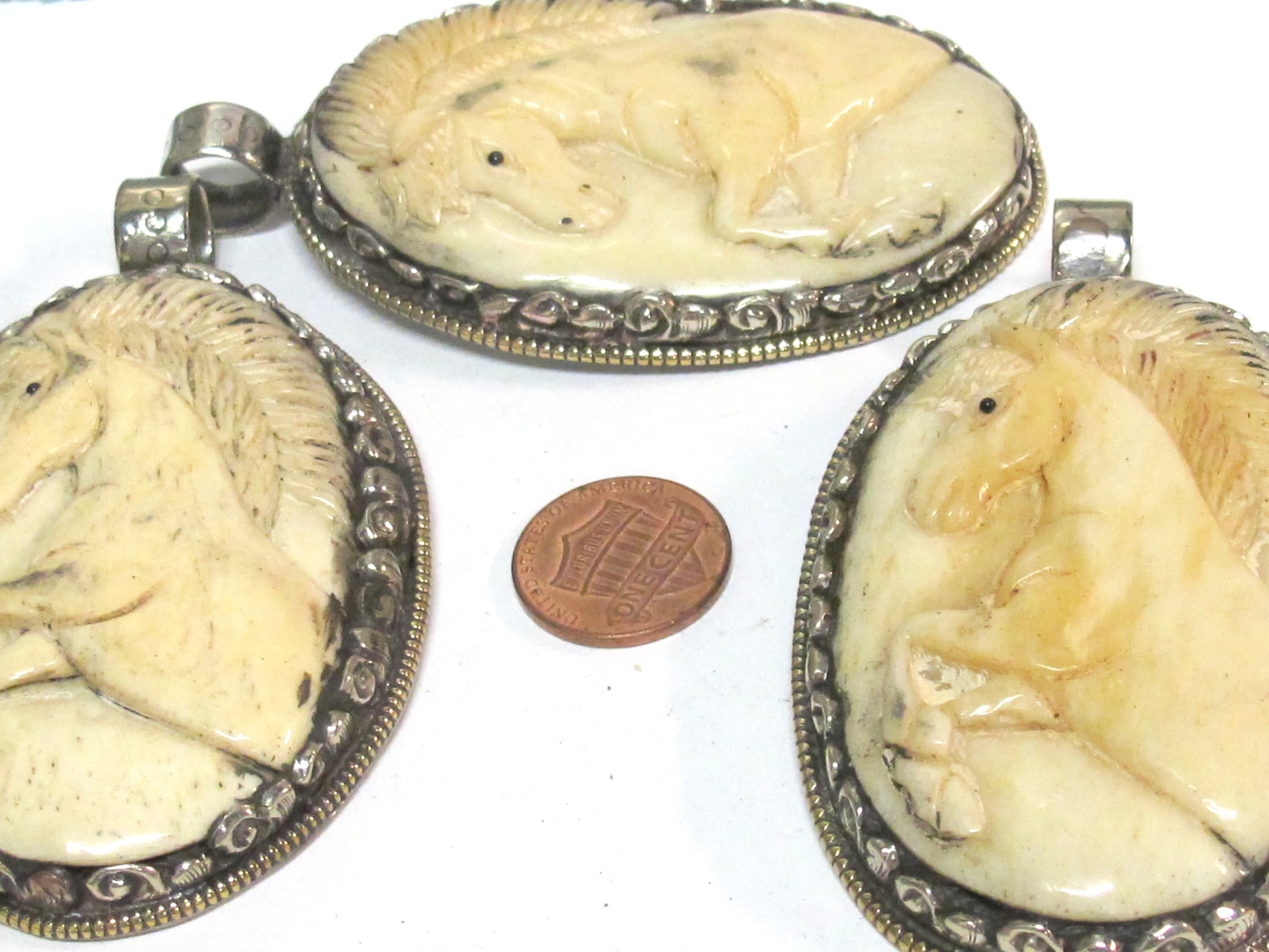 Unique large size carved cattle bone pendant with intricate unicorn horse design and floral carving on reverse side - PB008G