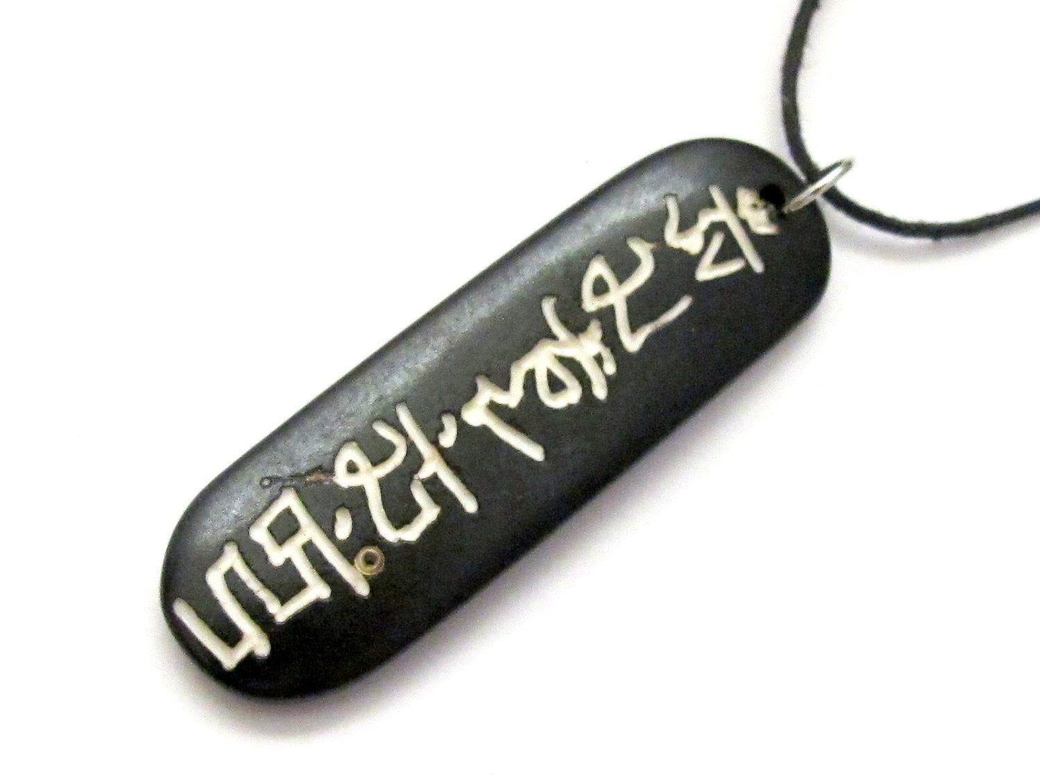 Bone pendant carved with Om mani padme hum - PB003
