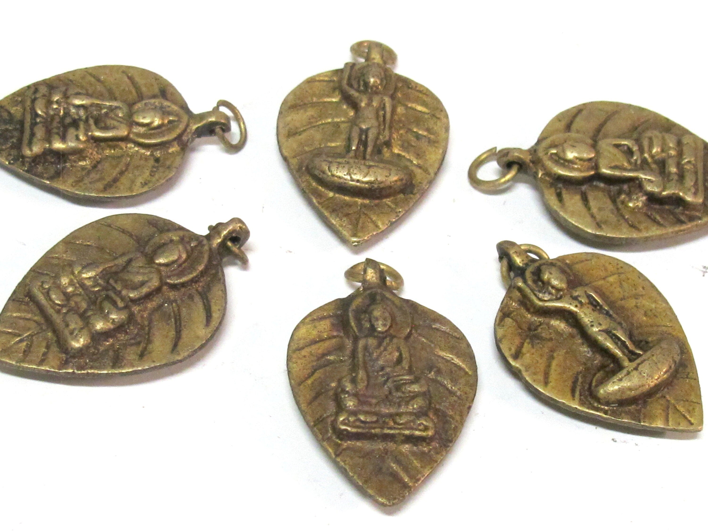 Reversible bodhi leaf shape standing Buddha and seated buddha Brass pendant from Nepal - CP068B