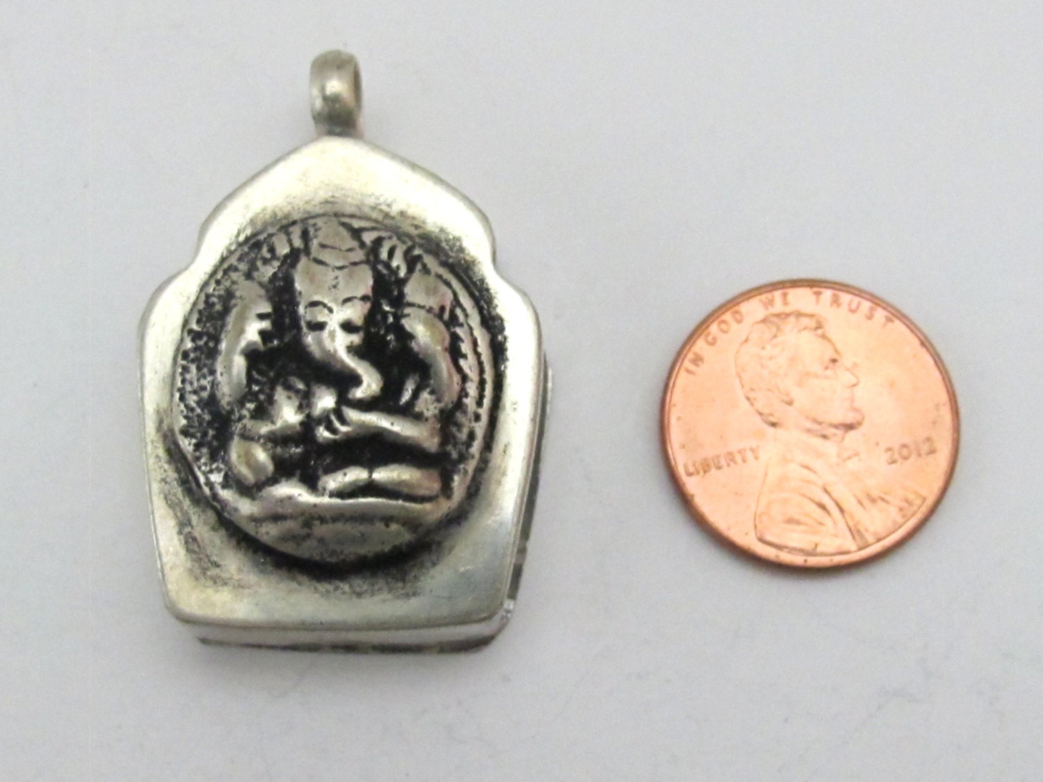 Four armed Ganesha Ghau prayer box pendant - PM178B