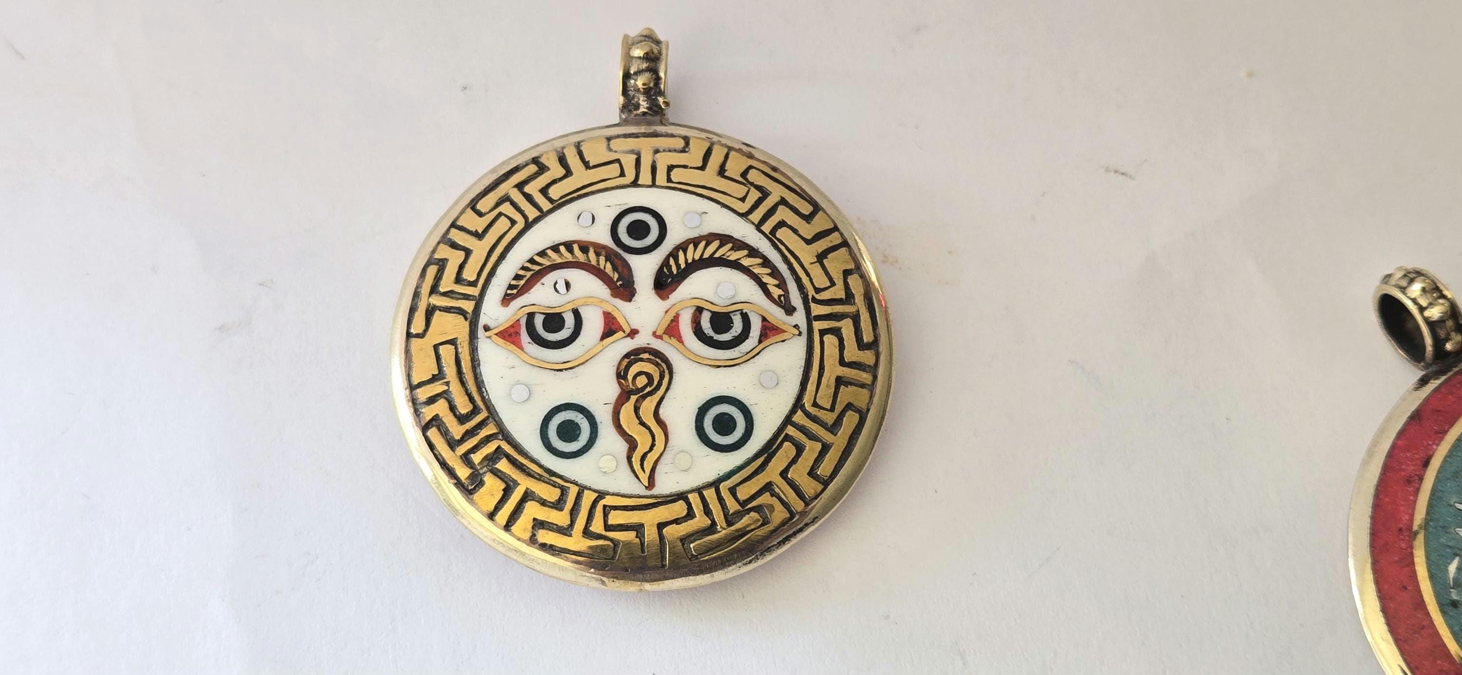 Reversible Tibetan Buddha eye and double dorje turquoise coral brass inlaid pendant - PM247G