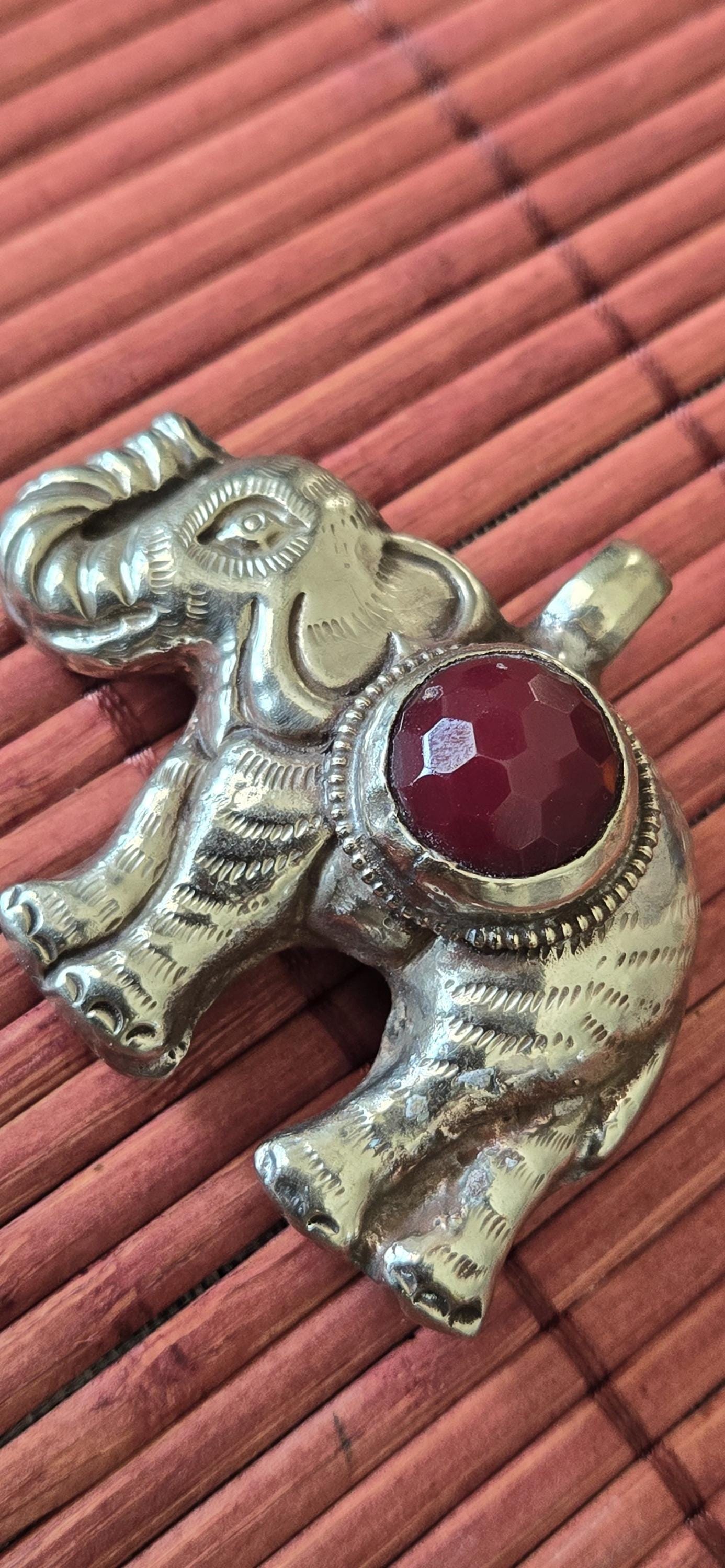 Tibetan Elephant Pendant with wine color faceted quartz gemstone inlay | Repousse Jewelry from Nepal | Bold Animal pendant PM438Q