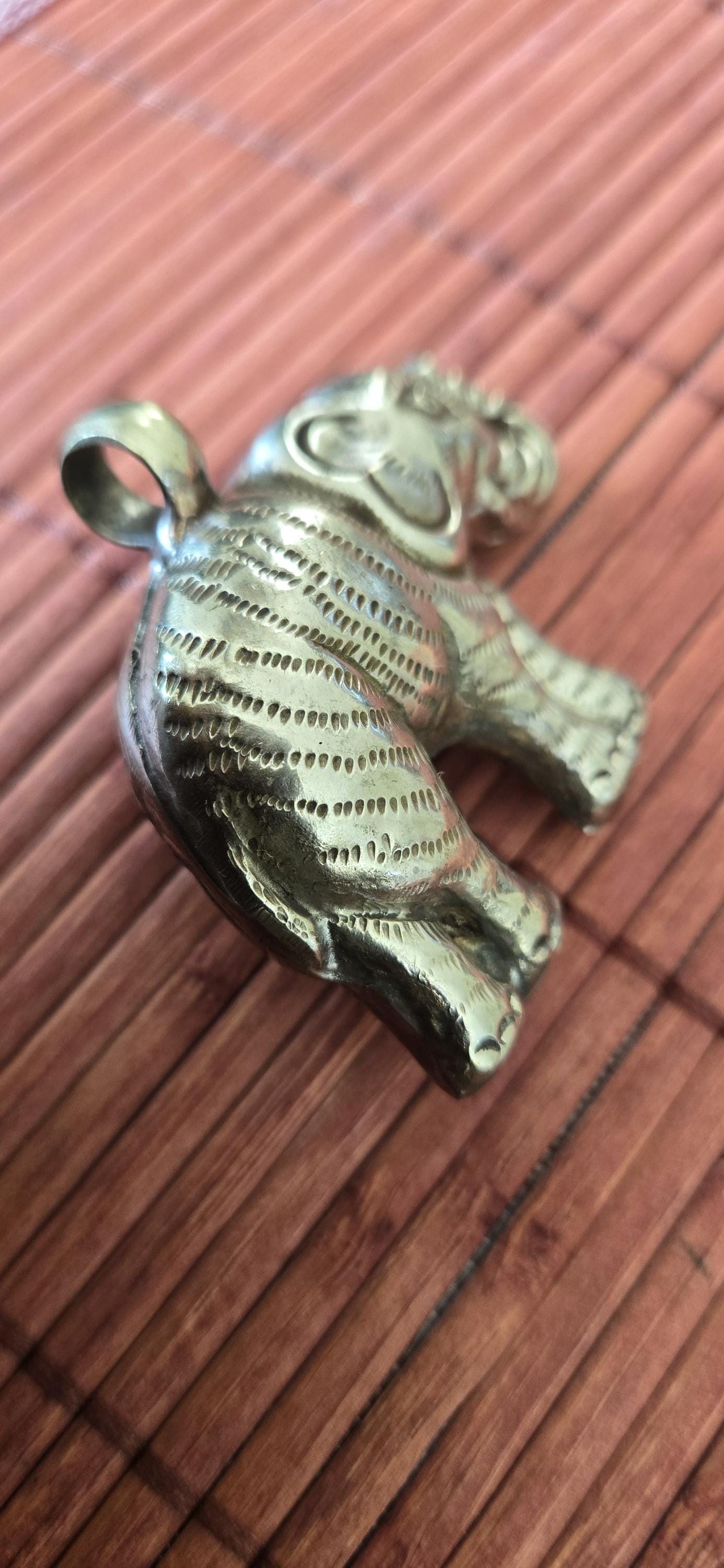Tibetan Elephant Pendant with wine color faceted quartz gemstone inlay | Repousse Jewelry from Nepal | Bold Animal pendant PM438Q
