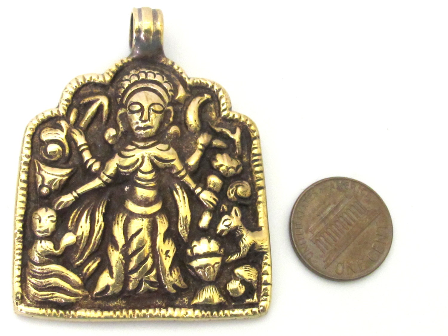 1 Pendant - Reversible ethnic forest deity brass pendant with reverse bird design from Nepal - CP074