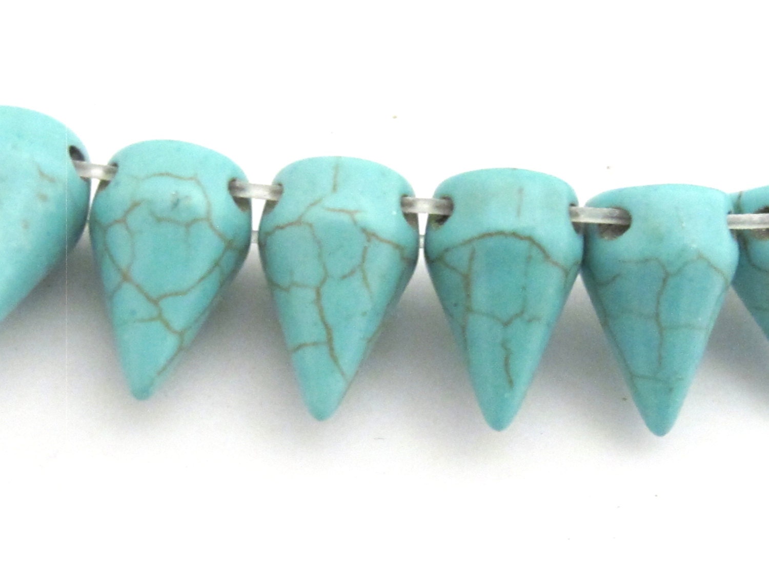 10 Beads - Turquoise color magnesite cone spike 2 hole beads - Gm369