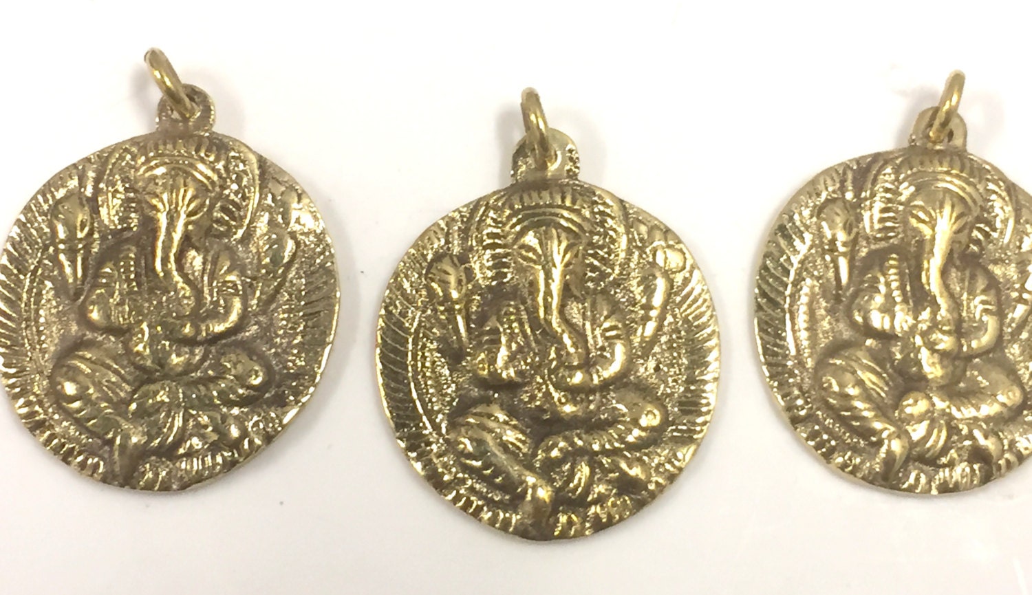 1 Pendant - Shree Ganesha brass pendant with reverse side inscribed prayer shree ganeshay namah - CP095 - Copyright Nepalbeadshop