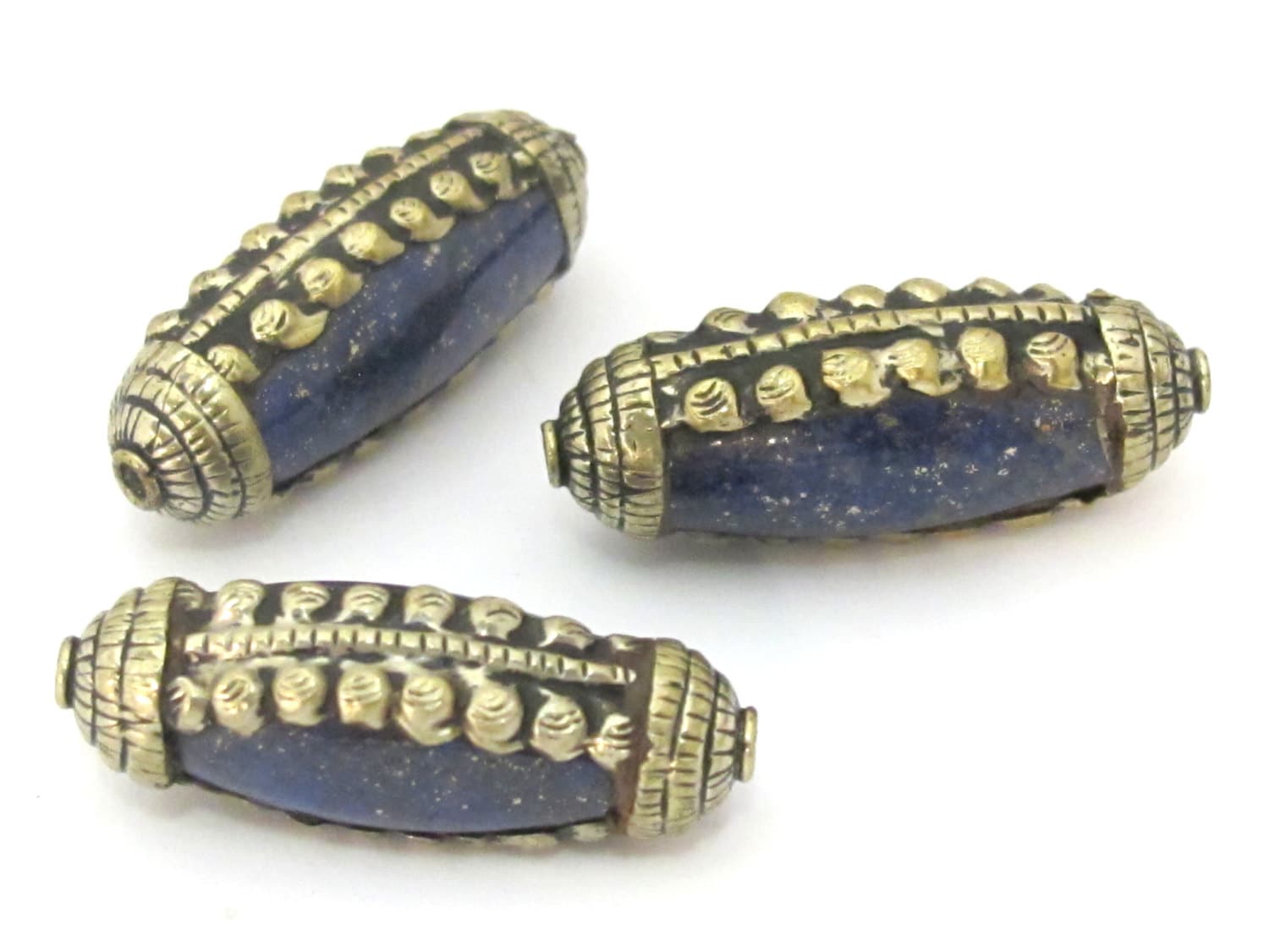 1 Bead- Tibetan silver encased long lapis lazuli gemstone bead from Nepal - BD895