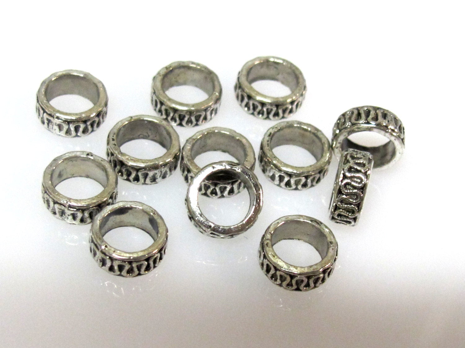 10 Beads - Antiqued silver tone metal alloy donut beads wavy design 8 mm wide x 4 mm - BD939