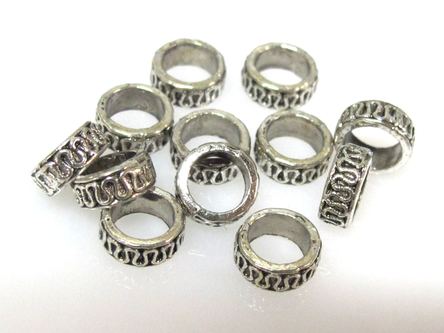 10 Beads - Antiqued silver tone metal alloy donut beads wavy design 8 mm wide x 4 mm - BD939
