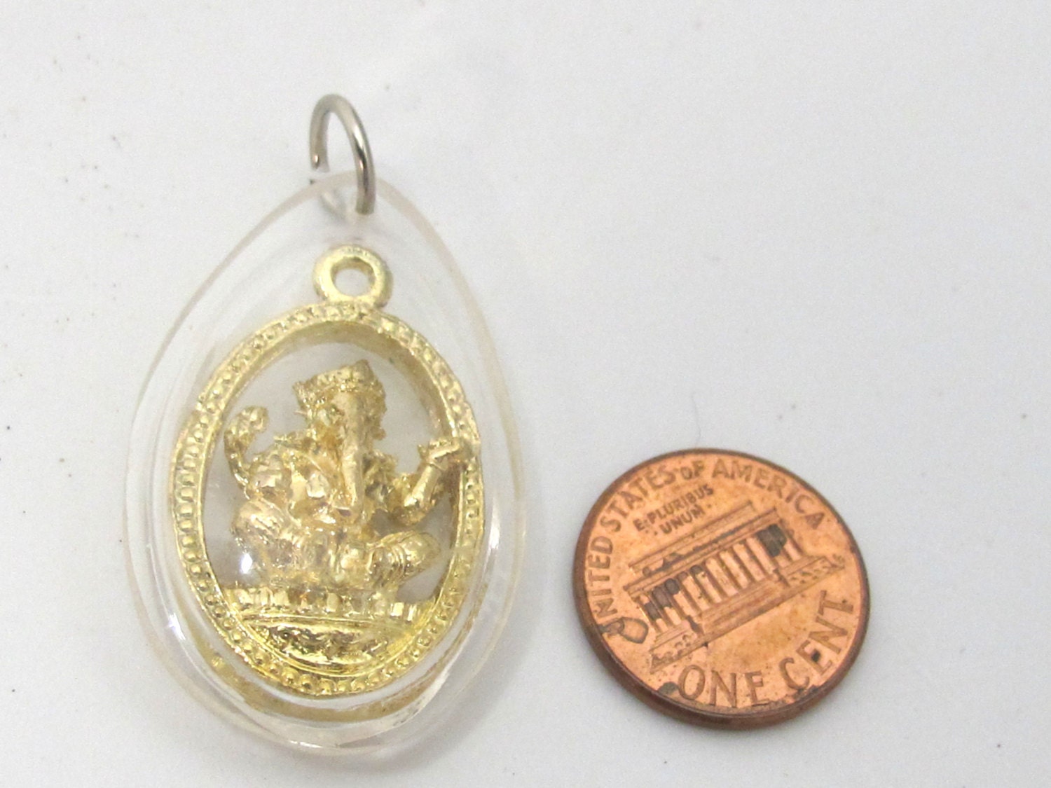 1 Pendant - Hindu lord Ganesha gold color plated brass charm pendant encased in clear resin from Nepal - great for keyring bag charm - PM520