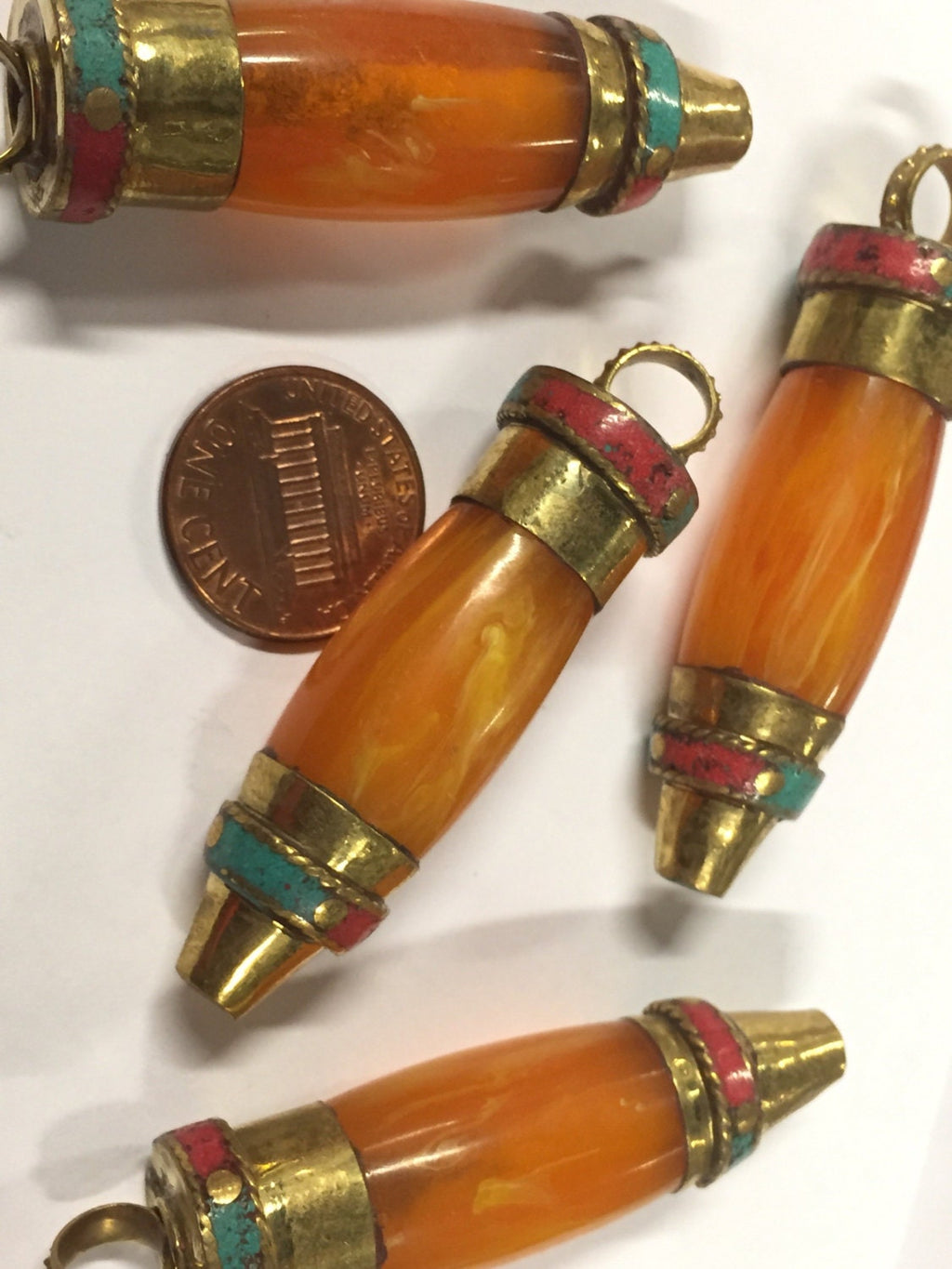 1 pendant - long Tibetan honey copal resin bullet shape pendant with brass cap and inlays - PM533