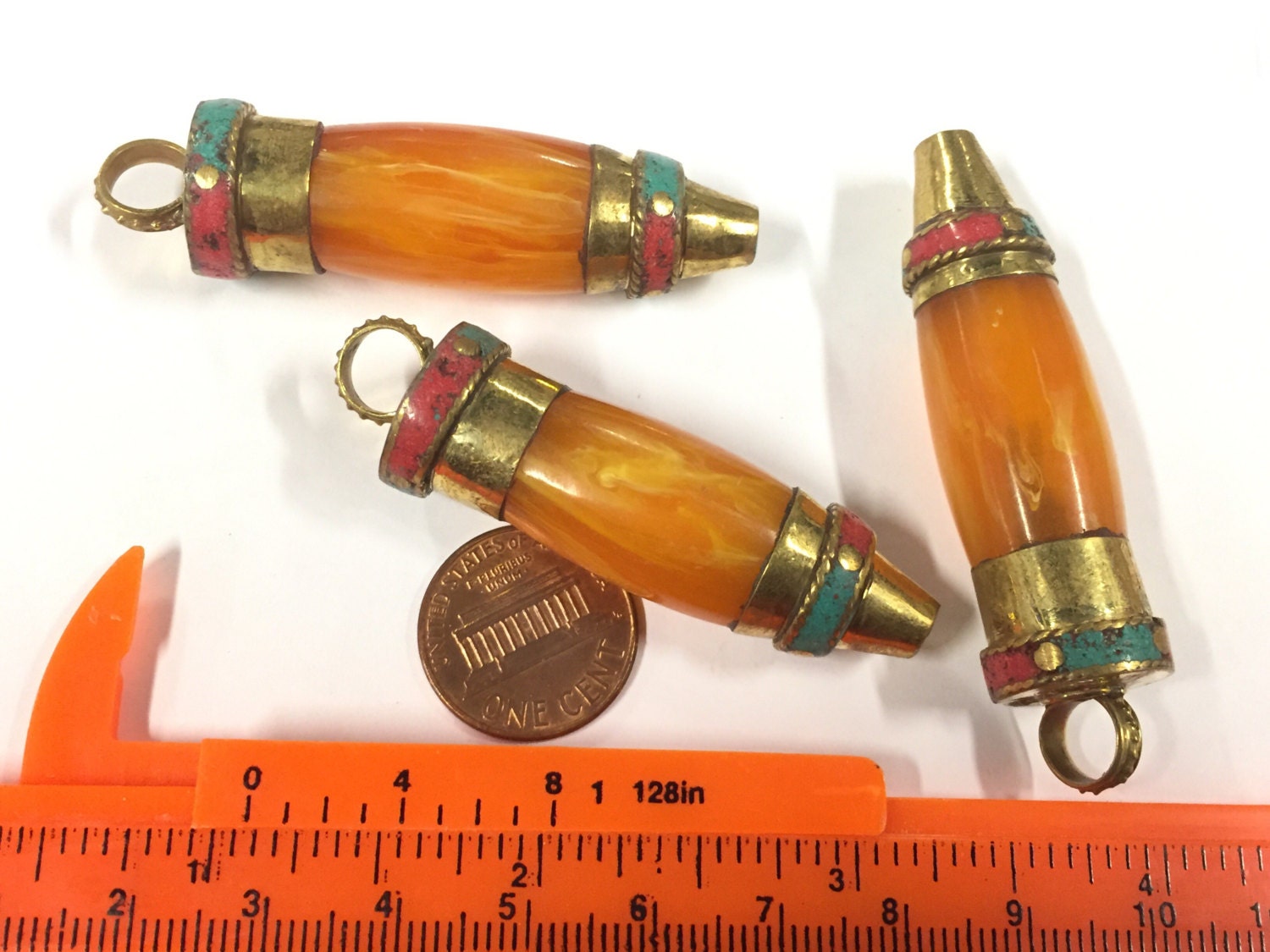 1 pendant - long Tibetan honey copal resin bullet shape pendant with brass cap and inlays - PM533