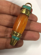 1 pendant - long Tibetan honey copal resin bullet shape pendant with brass cap and inlays - PM533