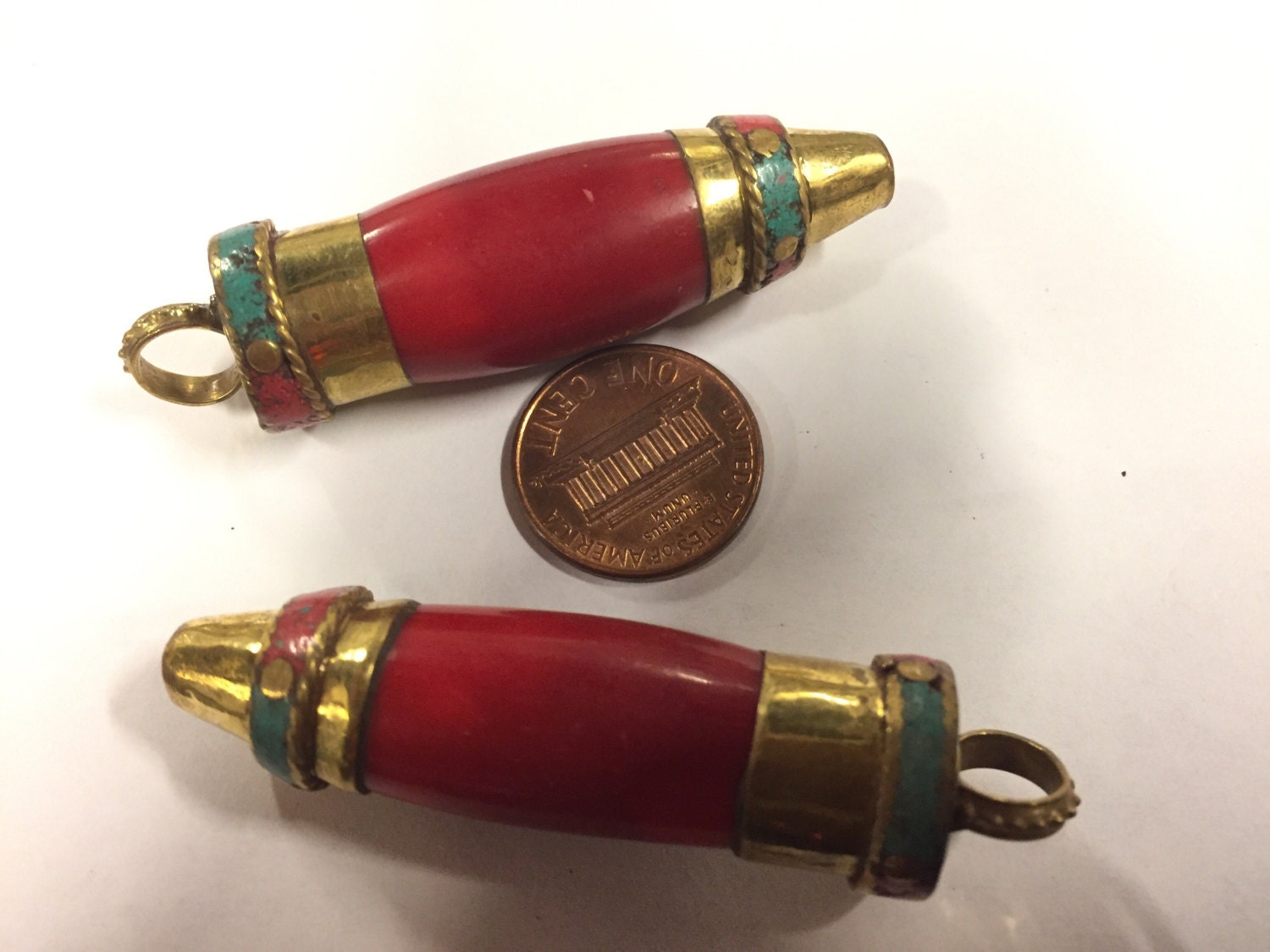 1 pendant - Tibetan red resin bullet shape pendant with brass cap and inlays - PM534