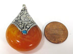 1 pendant - Tibetan silver yellow copal resin reversible pendant with lotus carved design on bail - PM538