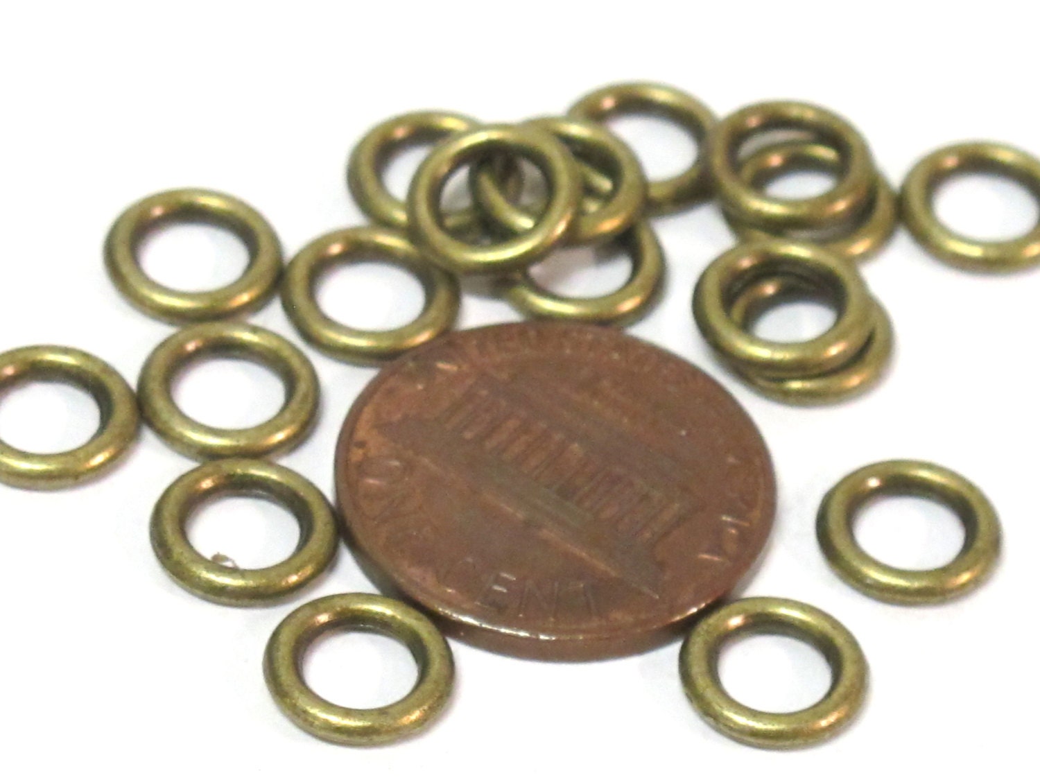 15 Beads - Antiqued brass color metal alloy donut shape ring beads 8 mm size - BD113A