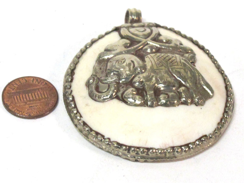 1 pendant - Large bold Tibetan Silver Repousse tribal naga conch shell pendant with elephant carving - PM490