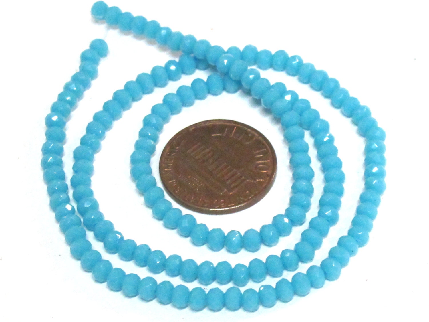 1 strand 15 inches long - 4 mm size Faceted rondelle shape blue color crystal glass beads - AB064