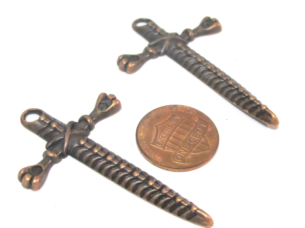 8 charms - Long antiqued copper color light weight sword shape charms 52 mm x 33 mm - CM204