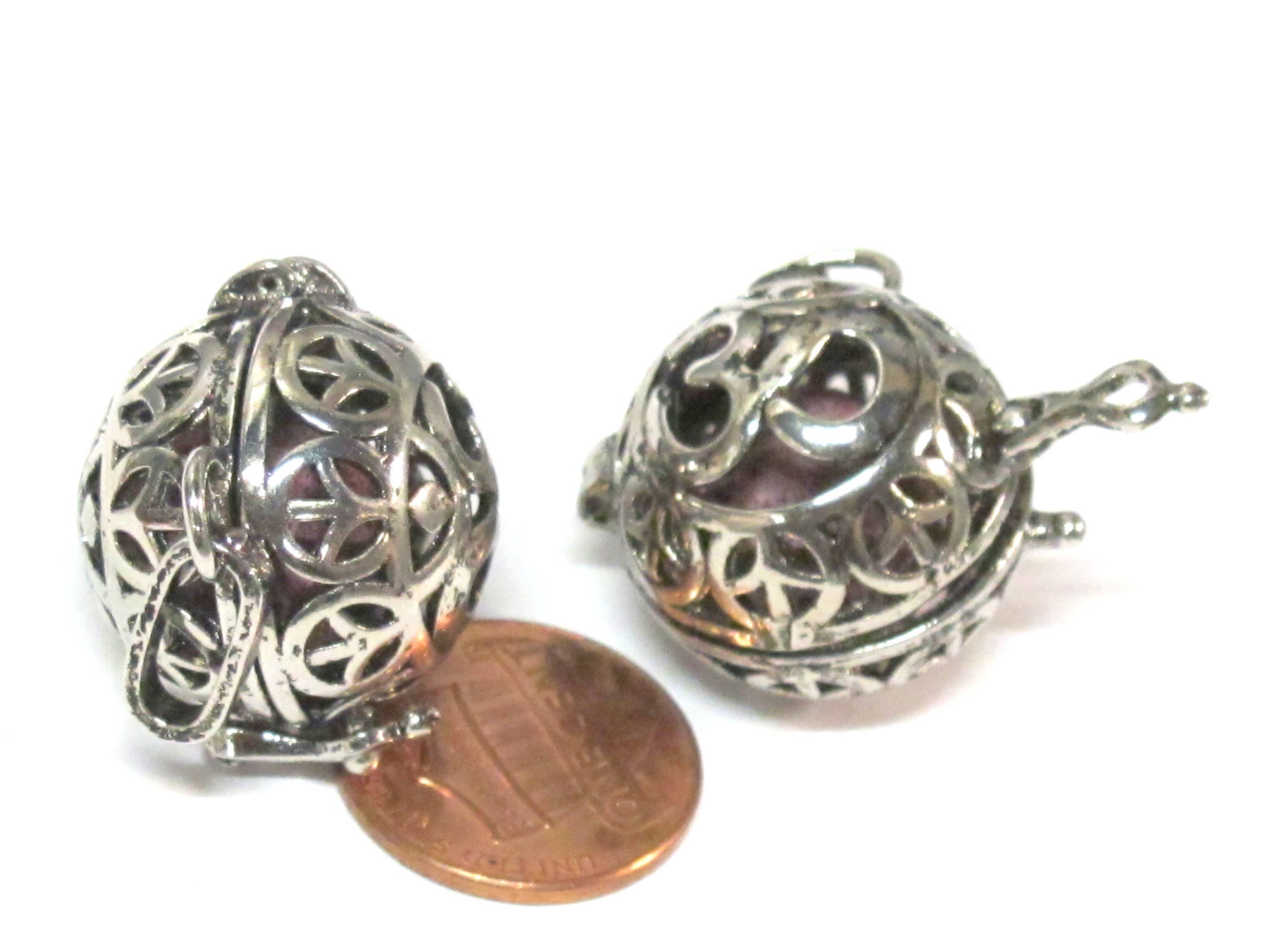 1 pendant - Tibetan om with peace symbol cage diffuser pendant with 1 lava bead - PM572