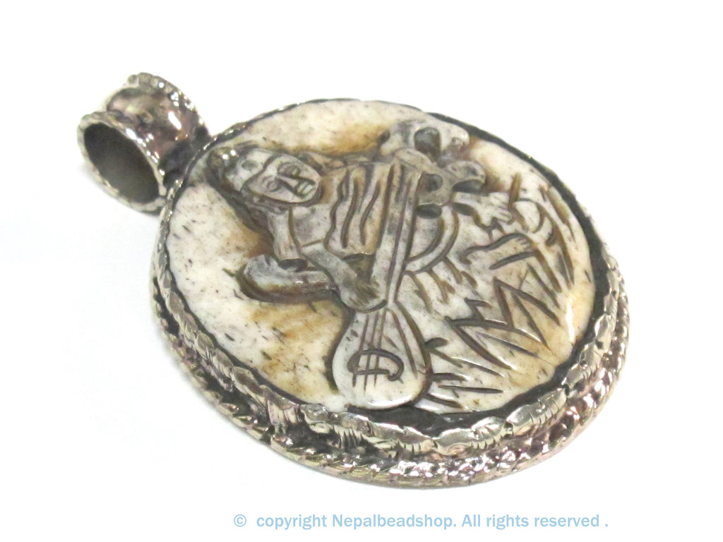 1 Pendant - Intricate carved ethnic Hindu Goddess Saraswati Maa recycled cattle bone pendant with floral carving on reverse side - PB007K