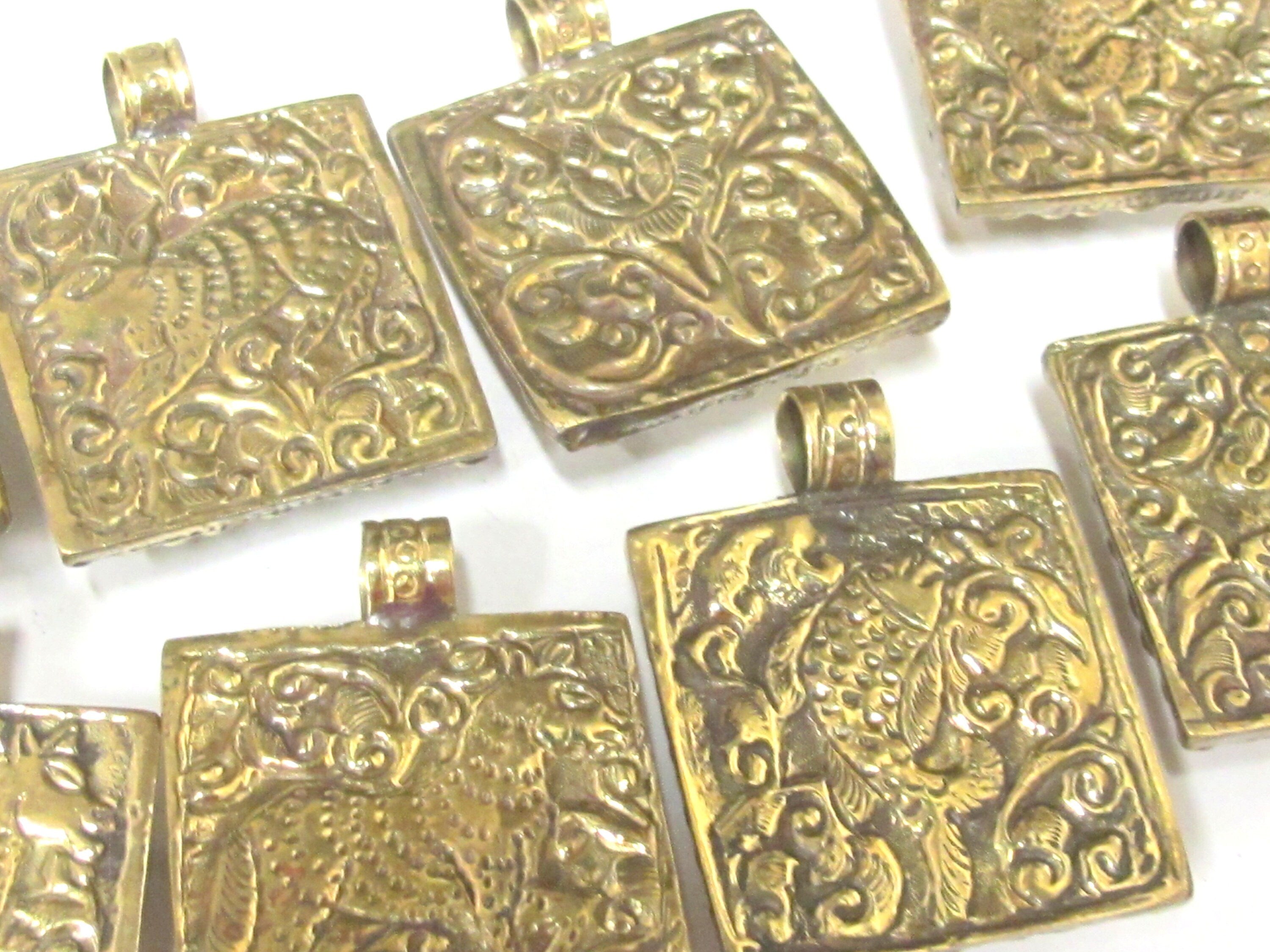 1 pendant - Tibetan square shape Buddha pendant antiqued golden color with floral animal mix design on other side - PM589A