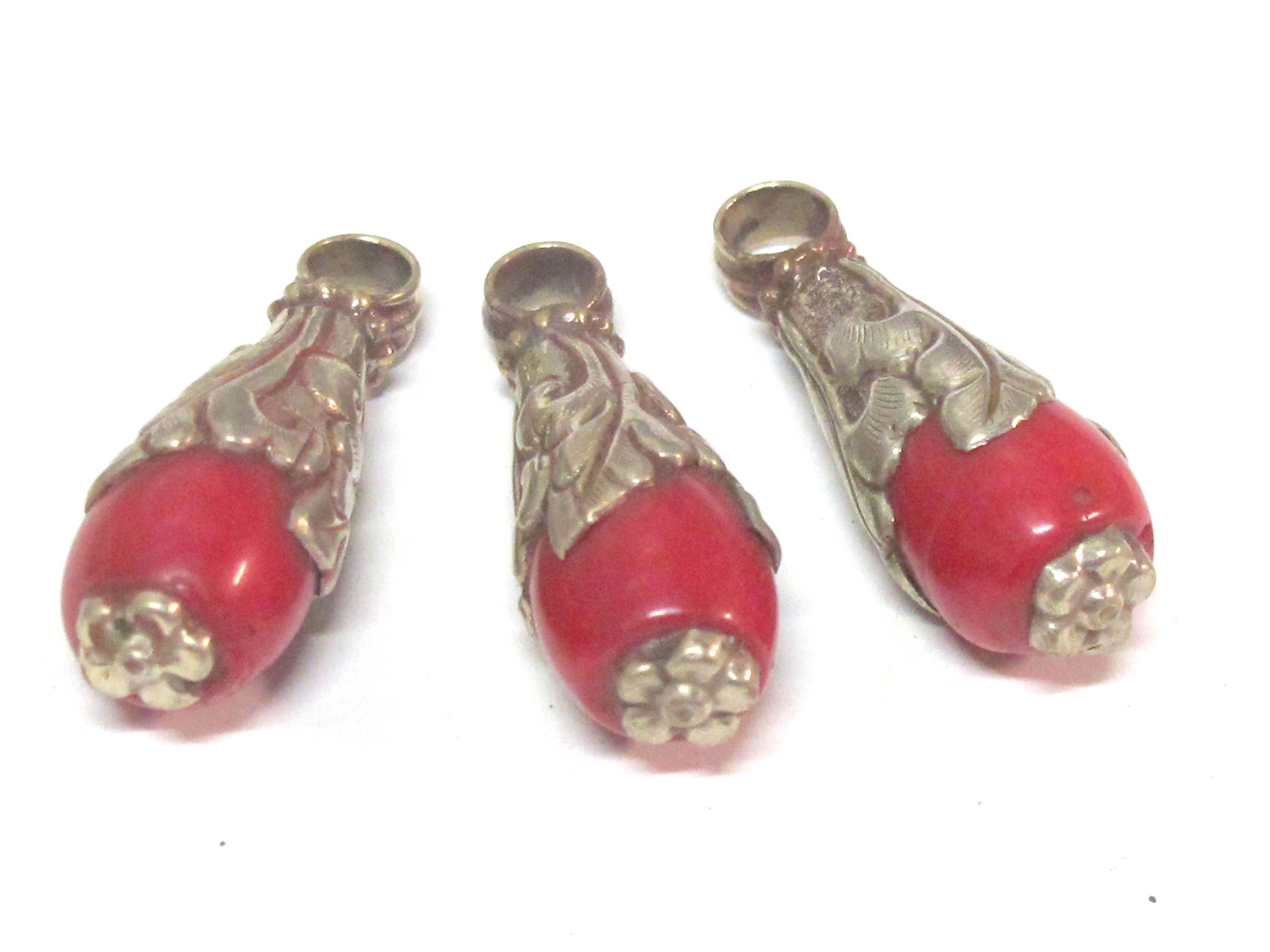 1 Pendant - Small medium sized Tibetan silver dyed coral drop pendant with floral design bail - PM592