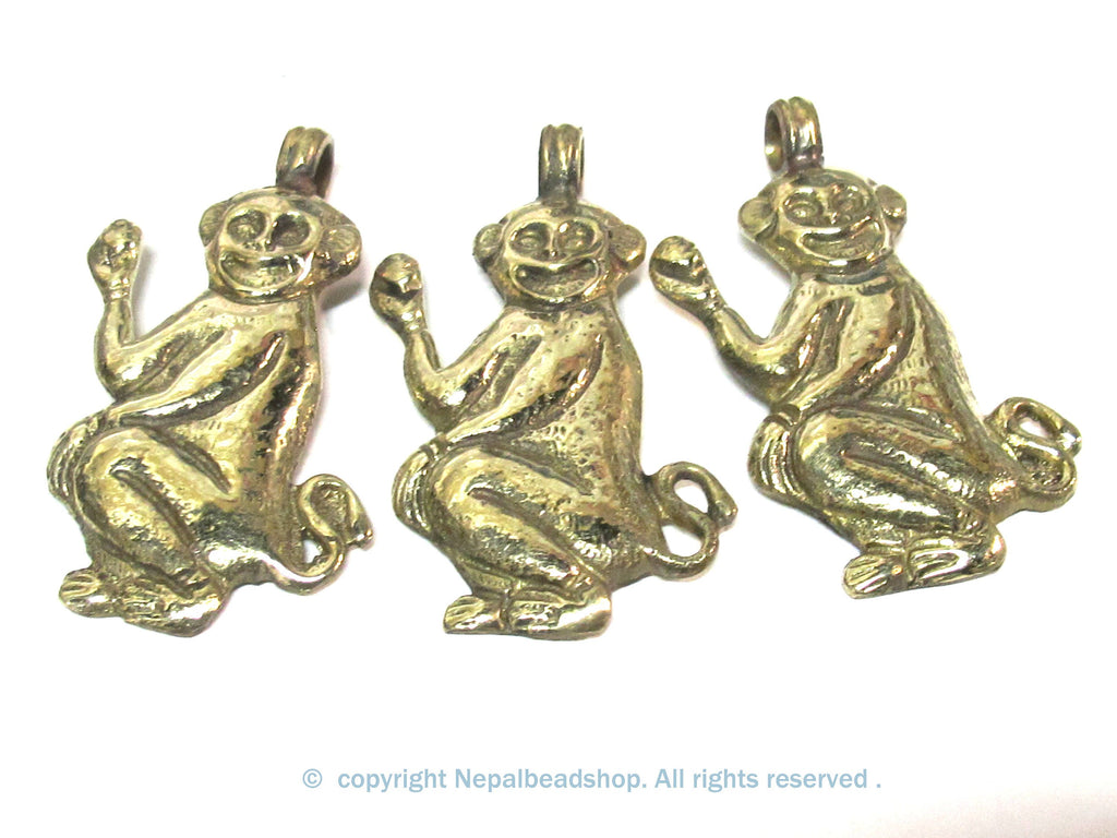 1 Pendant - Tibetan brass monkey pendant with floral carving on other side from Nepal - PM598