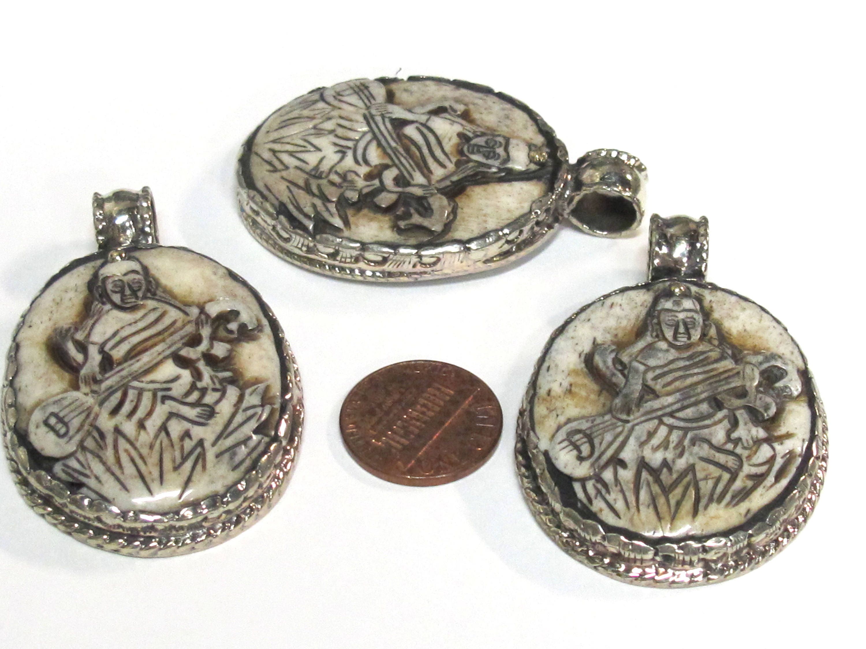 1 Pendant - Intricate carved ethnic Hindu Goddess Saraswati Maa recycled cattle bone pendant with floral carving on reverse side - PB007K