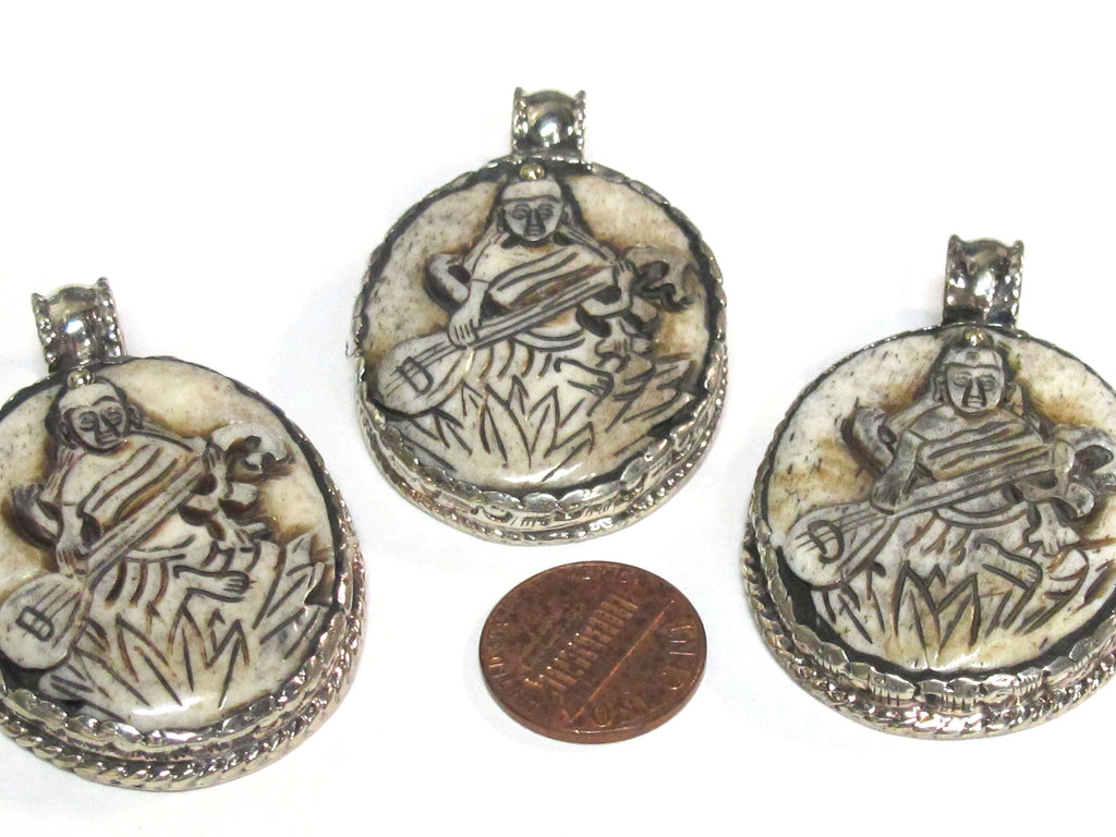 1 Pendant - Intricate carved ethnic Hindu Goddess Saraswati Maa recycled cattle bone pendant with floral carving on reverse side - PB007K