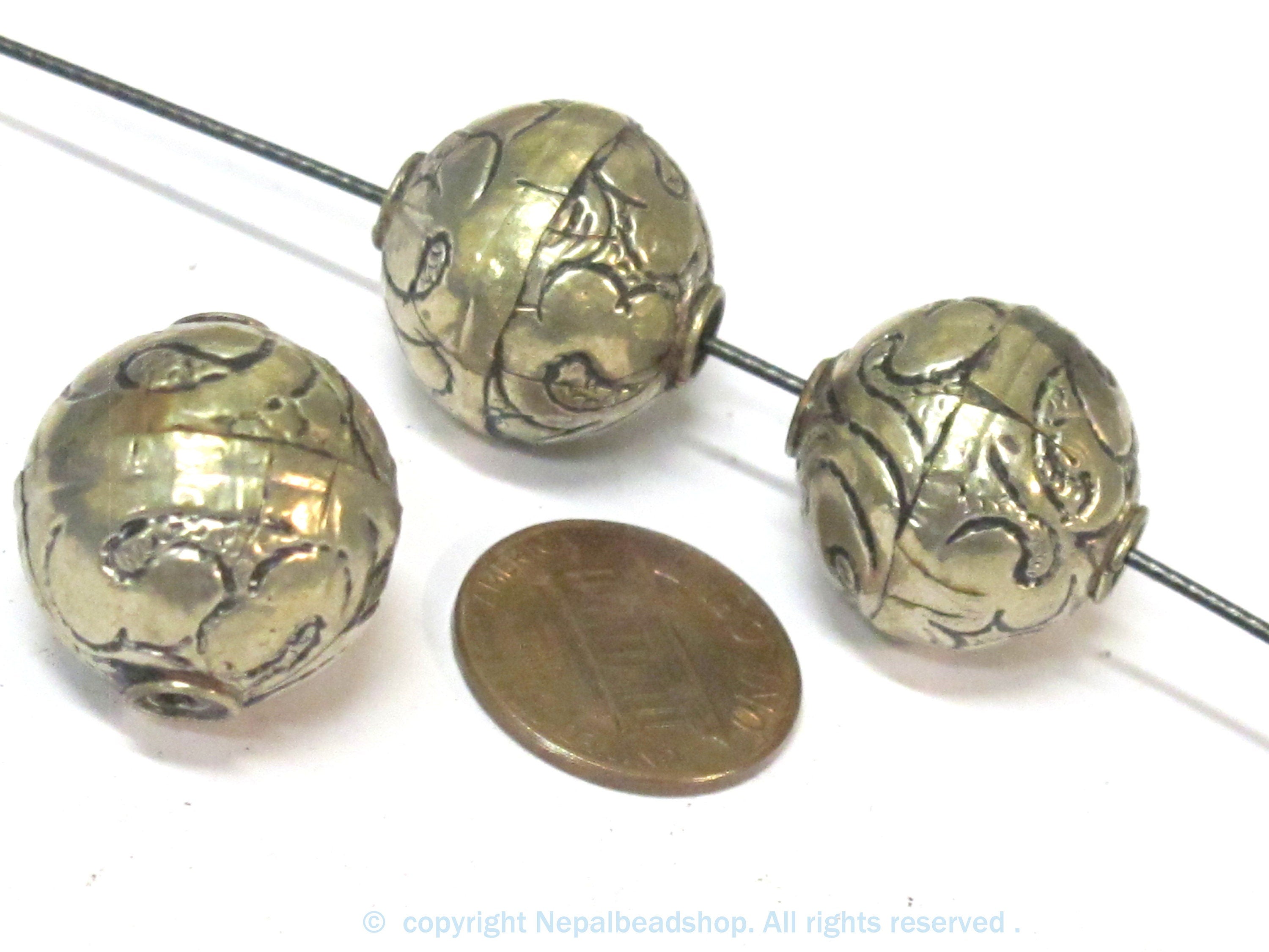 2 Beads - Tibetan repousse floral design oval shape beads 18 - 19 mm - BD978s