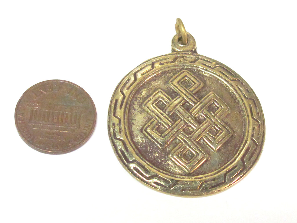 1 Pendant - Tibetan brass infinity knot endless knot symbol with reverse side om mantra pendant from Nepal - CP139