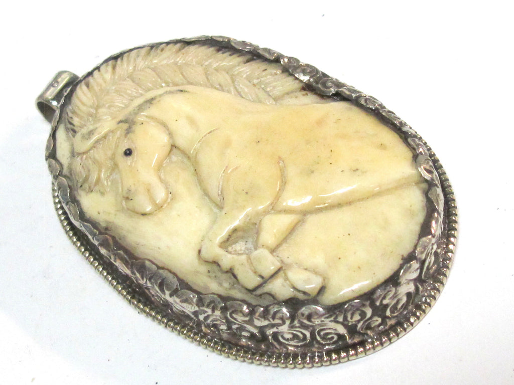 Unique large size carved cattle bone pendant with intricate unicorn horse design and floral carving on reverse side - PB008G