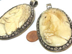 Unique large size carved cattle bone pendant with intricate unicorn horse design and floral carving on reverse side - PB008G
