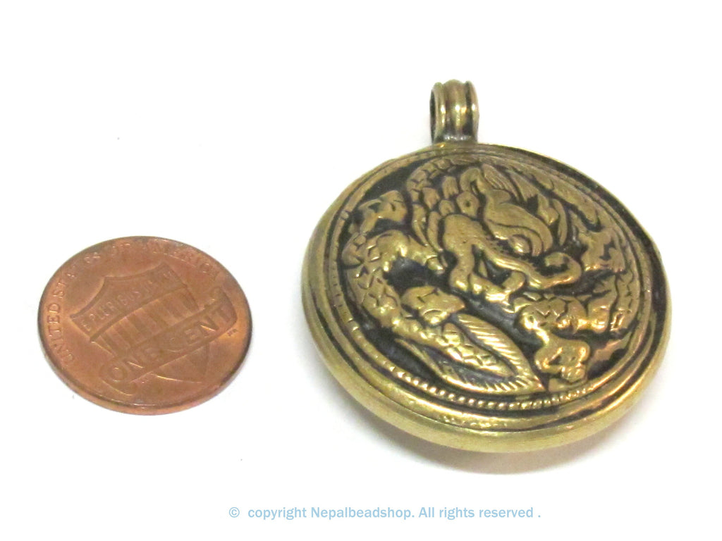 1 Pendant - Tibetan Brass reversible dragon pendant ethnic design brass filigree repousse carving Nepal - PM614