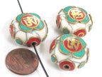 1 Bead - Tibetan Om white crackle resin reversible disc shape bead with brass , turquoise and coral inlay - BD828M