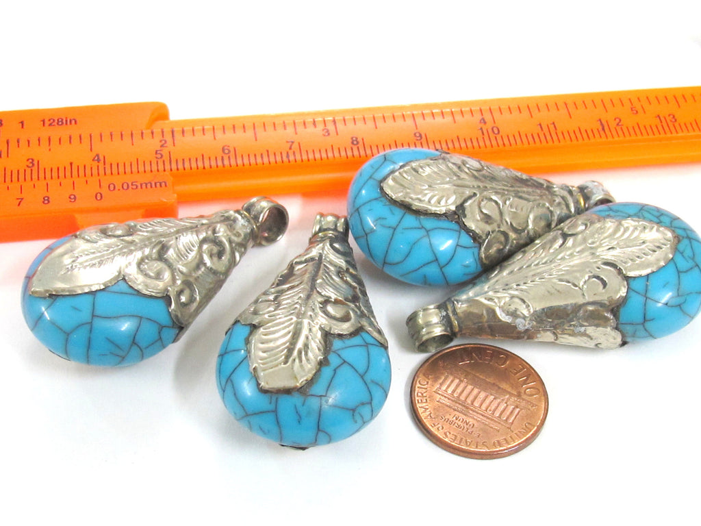1 Pendant - Tibetan silver color capped teardrop shape blue crackle resin pendant from Nepal - PM316E