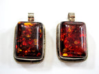 Beautiful Tibetan honey color resin pendant with floral design on reverse side Tibetan pendant Nepal jewelry supply nepalbeadshop PM704A