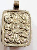 Beautiful Tibetan honey color resin pendant with floral design on reverse side Tibetan pendant Nepal jewelry supply nepalbeadshop PM704A
