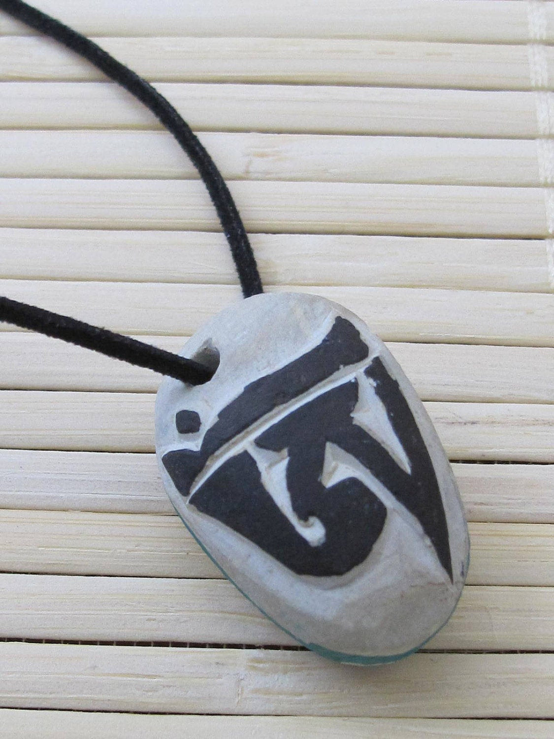 Tibetan Om fish reversible focal pendant bead-PB009