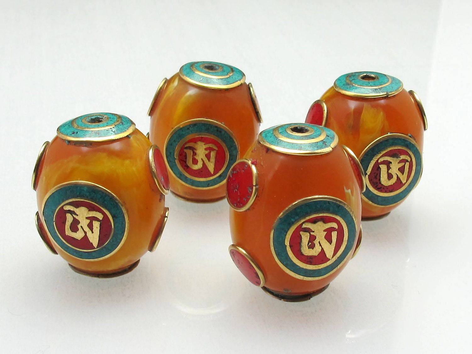 Tibetan copal resin Om bead with brass , turquoise and inlay - 1 bead - BD114s