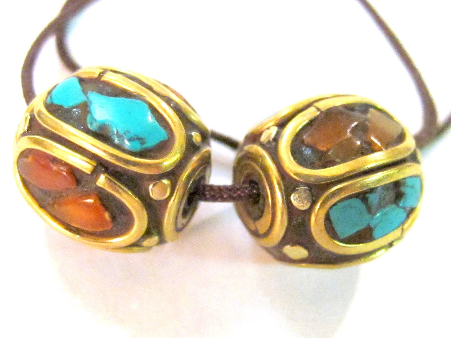 2 Beads - Nepalese brass beads oval shape with turquoise inlay - BD043