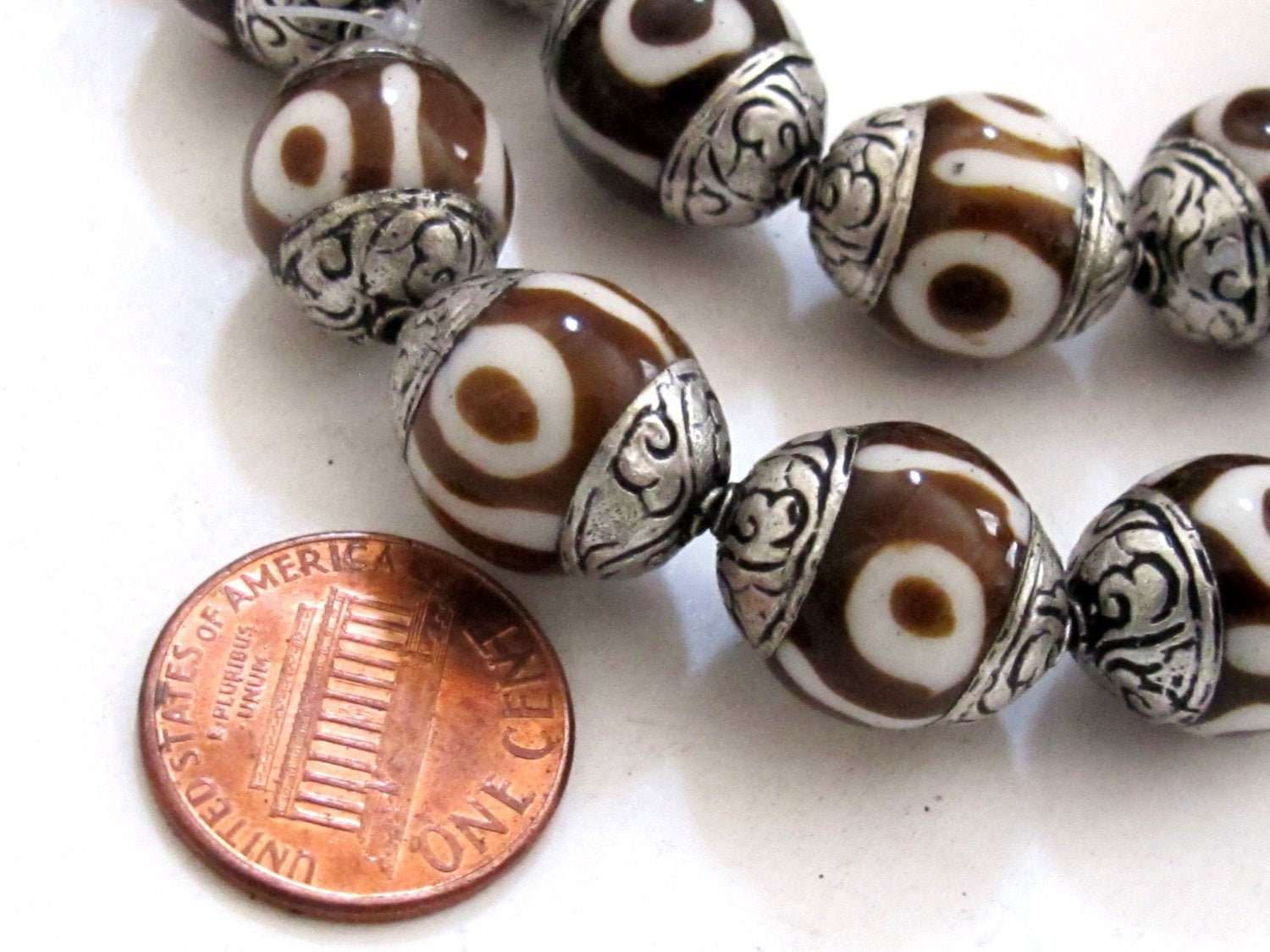 2 BEADS - Tibetan silver capped batik dzi design bone bead - BD522A