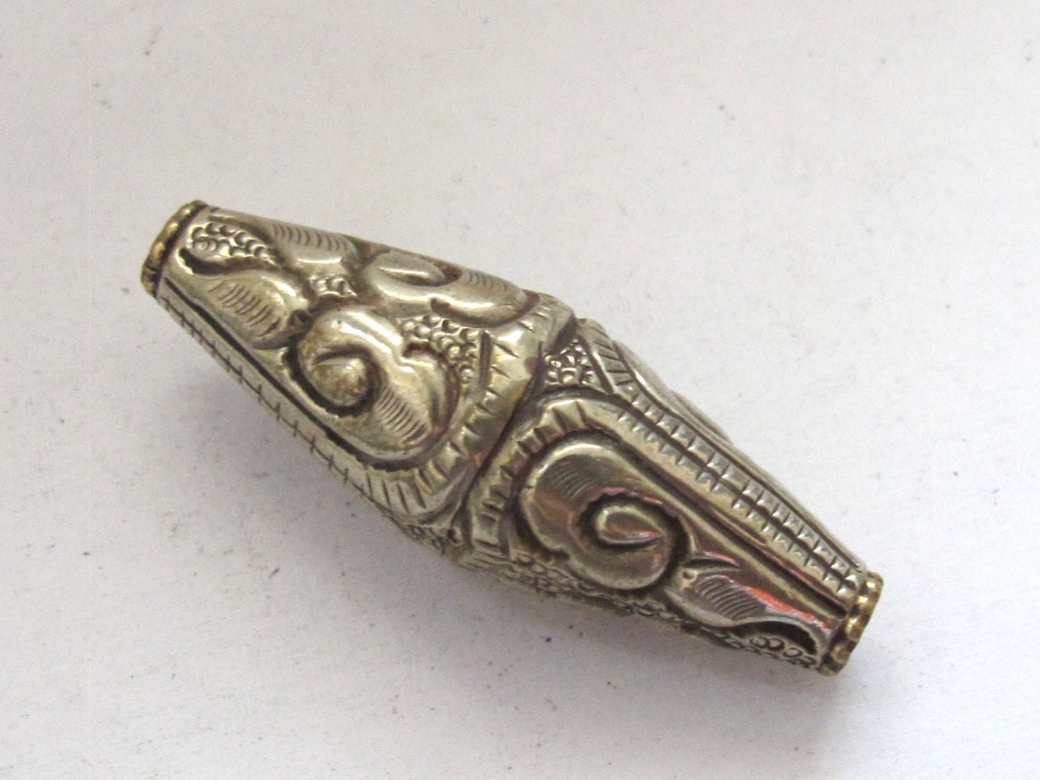 1 BEAD - Tibetan silver bicone shape floral repousse ethnic bead from Nepal - 1 bead - BD593