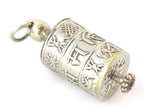 Tibetan antiqued silver Om Mantra with auspicious symbols spinnable prayer wheel scroll pendant light-weight Nepal - SP022