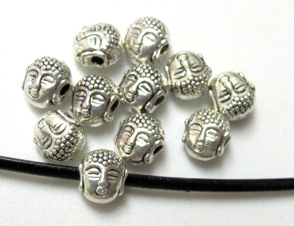 10 Beads - Dual sided Tibetan Buddha bead - BD386