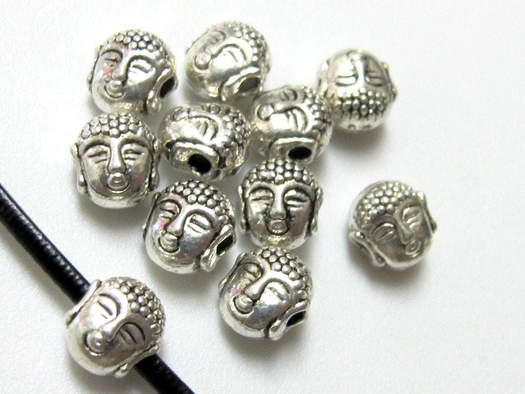 10 Beads - Dual sided Tibetan Buddha bead - BD386