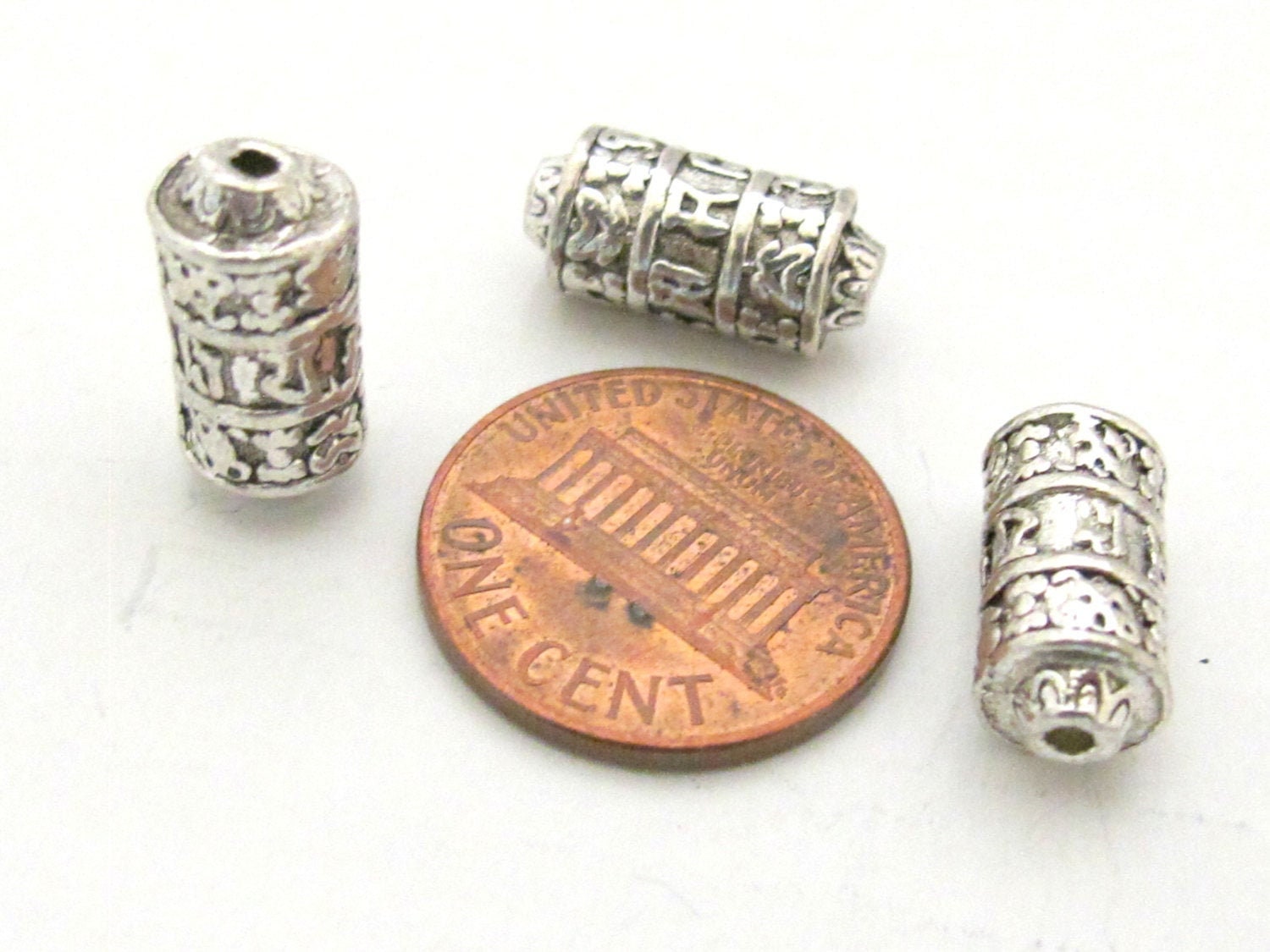 4 BEADS - Tibetan om mantra ashtamangala symbols scroll shape silver tone metal beads 15 mm x 7 mm - BD788