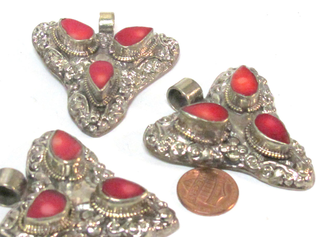 1 Pendant - Ethnic Tibetan triangular arrowhead shape coral inlaid pendant from Nepal with floral fish carving on reverse side - PM585B